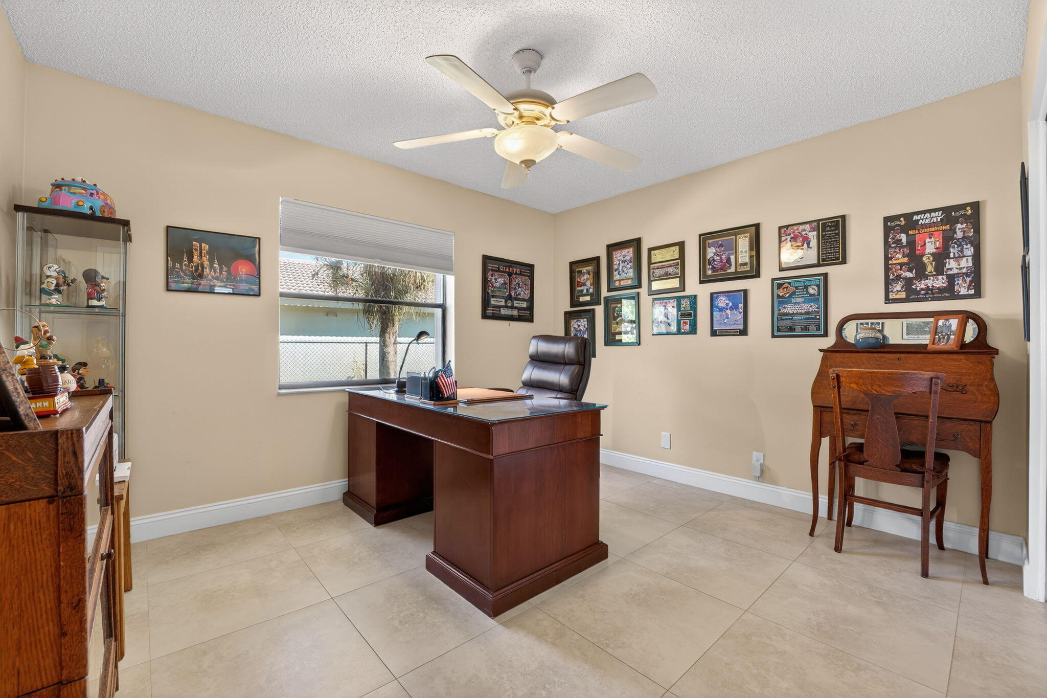5111 Northwest 85th Road Coral Springs, FL 33067 - Photo 28 of 47 a living room with furniture and dresser