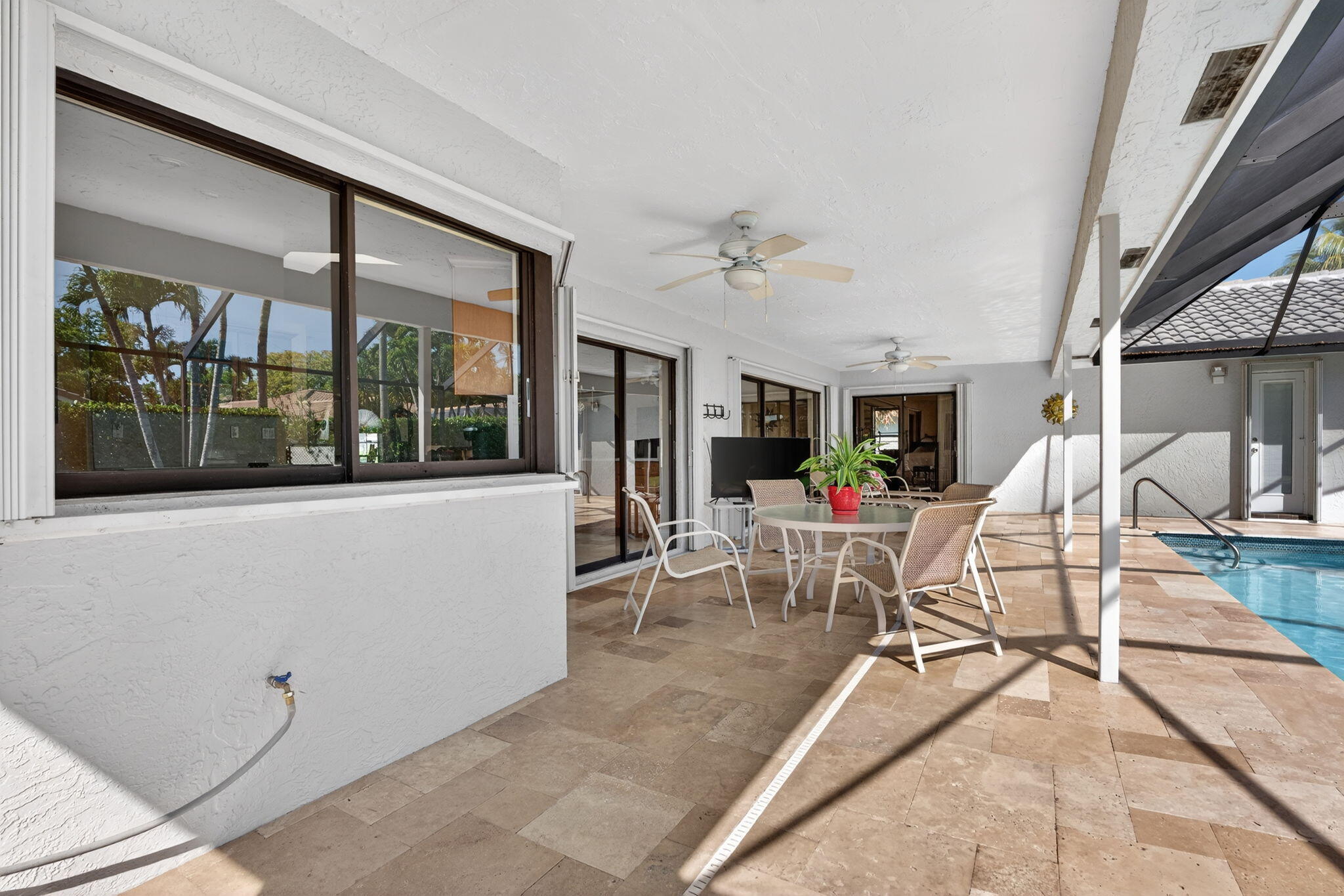 5111 Northwest 85th Road Coral Springs, FL 33067 - Photo 39 of 47 a living room with furniture and a large window