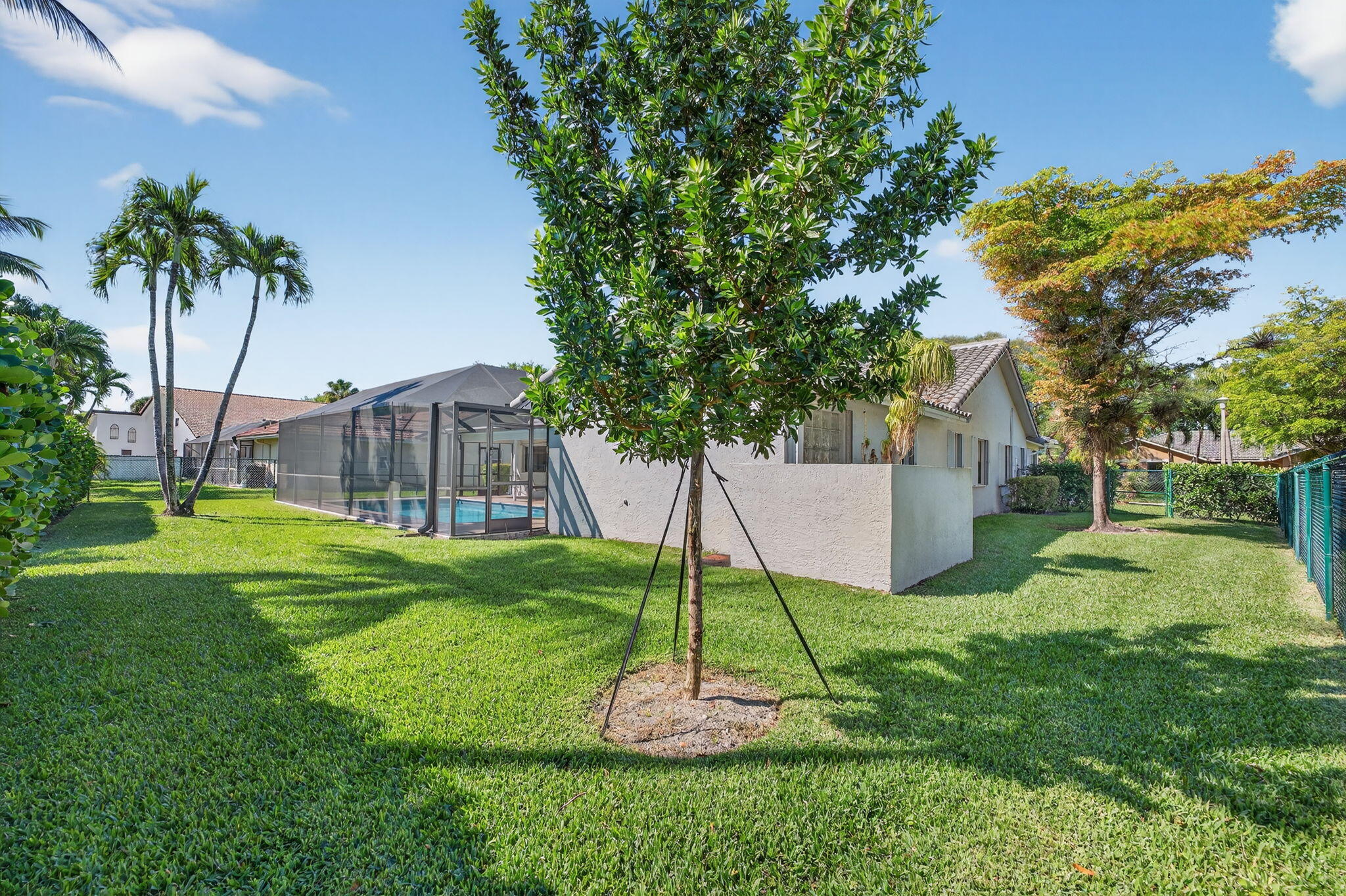 5111 Northwest 85th Road Coral Springs, FL 33067 - Photo 44 of 47 a small garden in the back yard