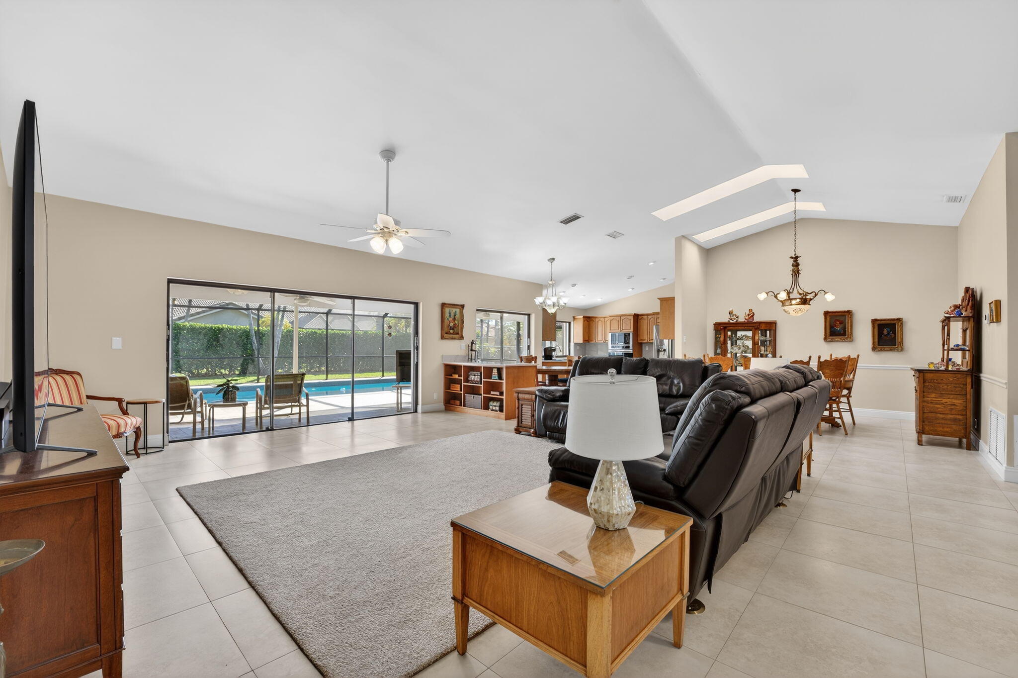 5111 Northwest 85th Road Coral Springs, FL 33067 - Photo 9 of 47 a living room with furniture and a table