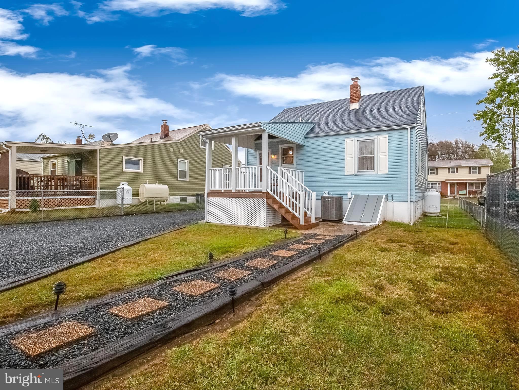306 Sassafras Road Baltimore, MD 21221 - Photo 32 of 37 LANDSCAPED PATH FROM GARAGE TO HOUSE