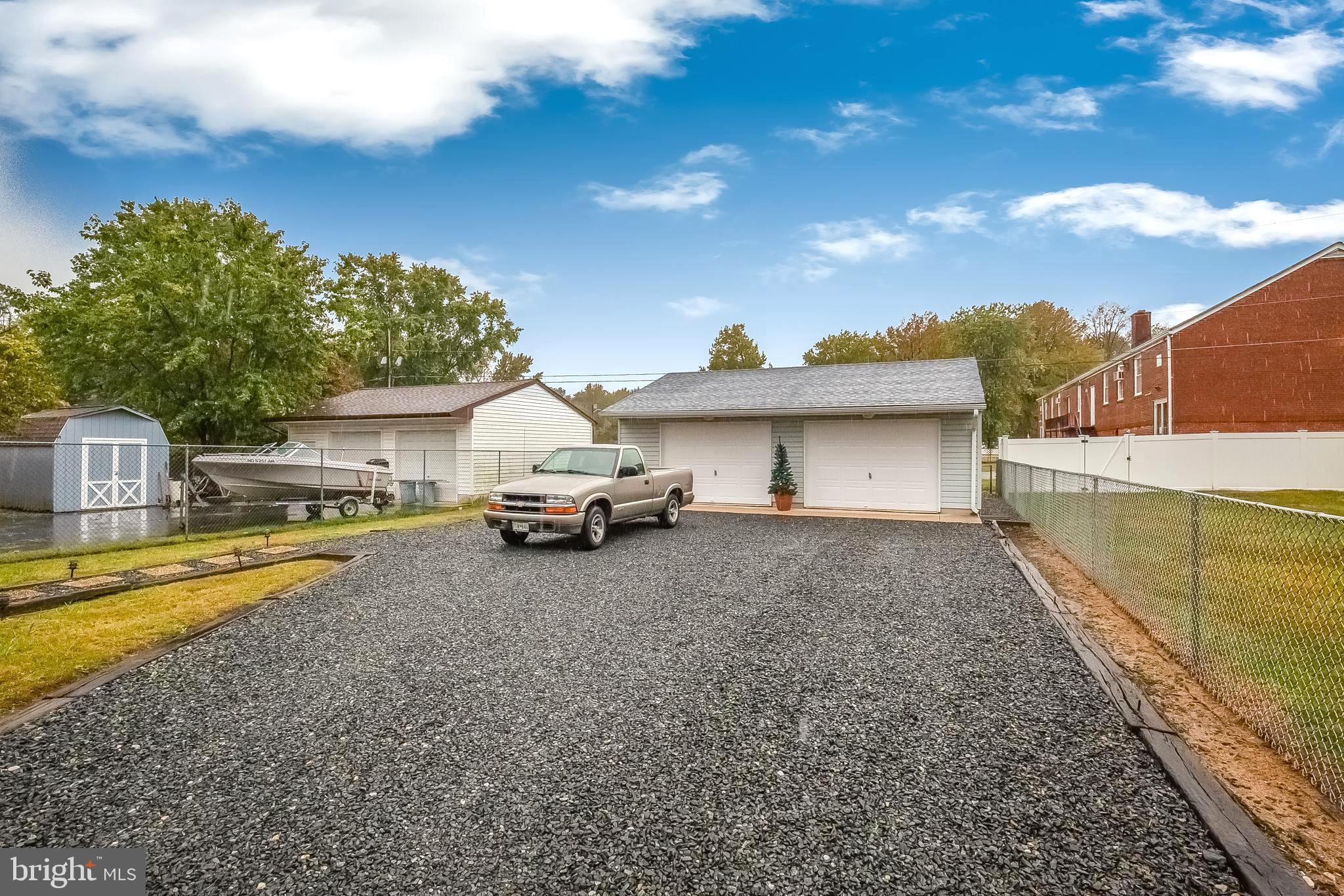 306 Sassafras Road Baltimore, MD 21221 - Photo 33 of 37 LG DRIVEWAY & OVERSIZED 2-CAR GARAGE