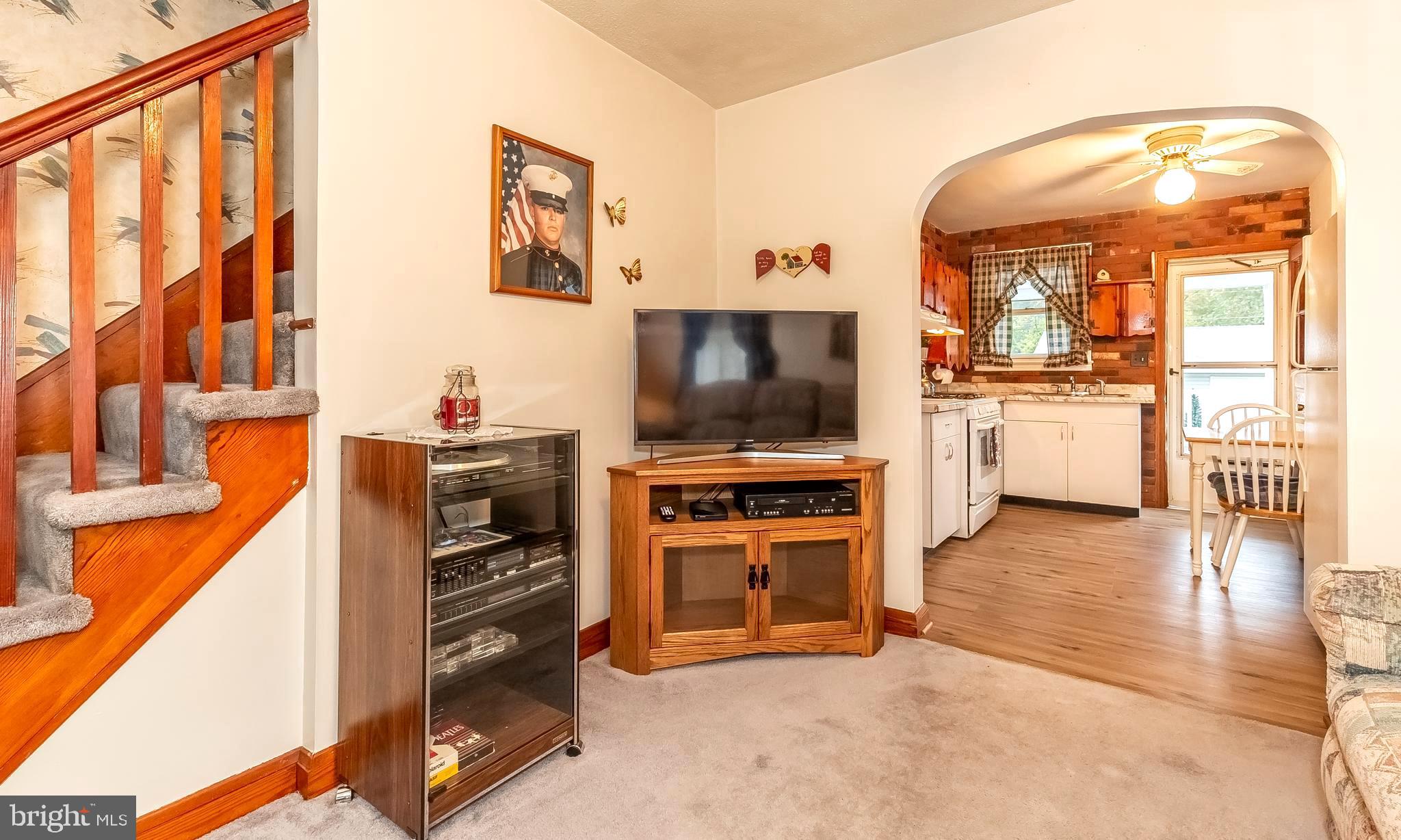 306 Sassafras Road Baltimore, MD 21221 - Photo 8 of 37 LIVING RM LEADING TO KITCHEN