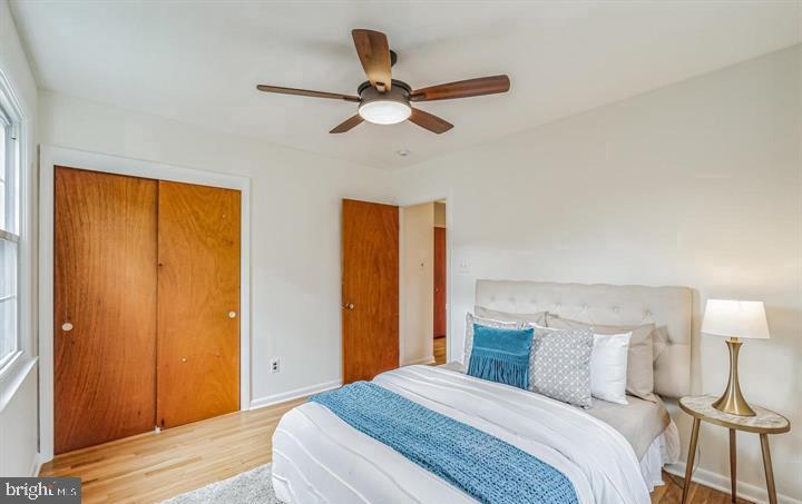 645 Glendale Road Havertown, PA 19083 - Photo 14 of 22 a bedroom with a bed and a chandelier