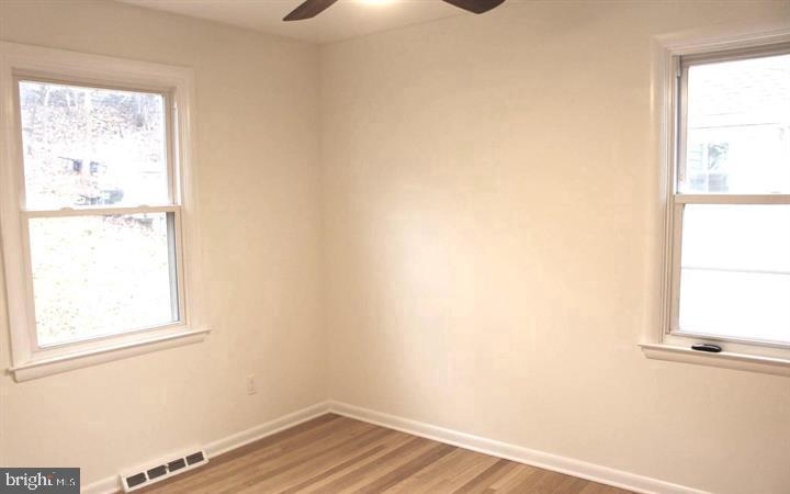 645 Glendale Road Havertown, PA 19083 - Photo 17 of 22 a view of an empty room and window