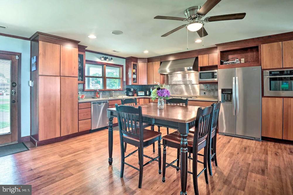 919 Oakdene Road Middle River, MD 21220 - Photo 9 of 26 Modern kitchen with warm wood tones.