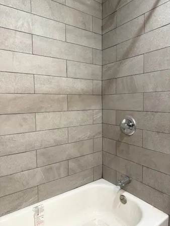 a bathroom with a bathtub