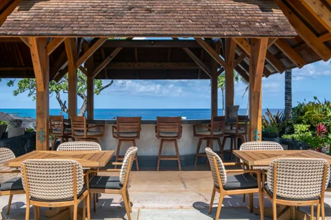 a view of a terrace with furniture