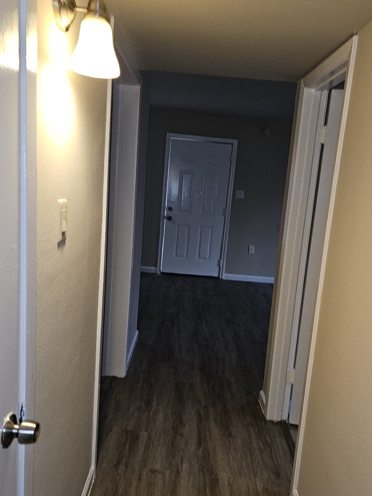 6815 Beachwood Street, Unit 3 Houston, TX 77021 - Photo 14 of 16 a view of hallway with wooden floor
