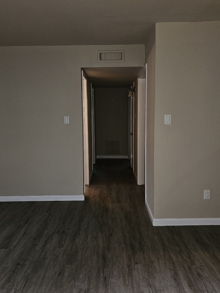6815 Beachwood Street, Unit 3 Houston, TX 77021 - Photo 6 of 16 a view of a hallway with wooden floor