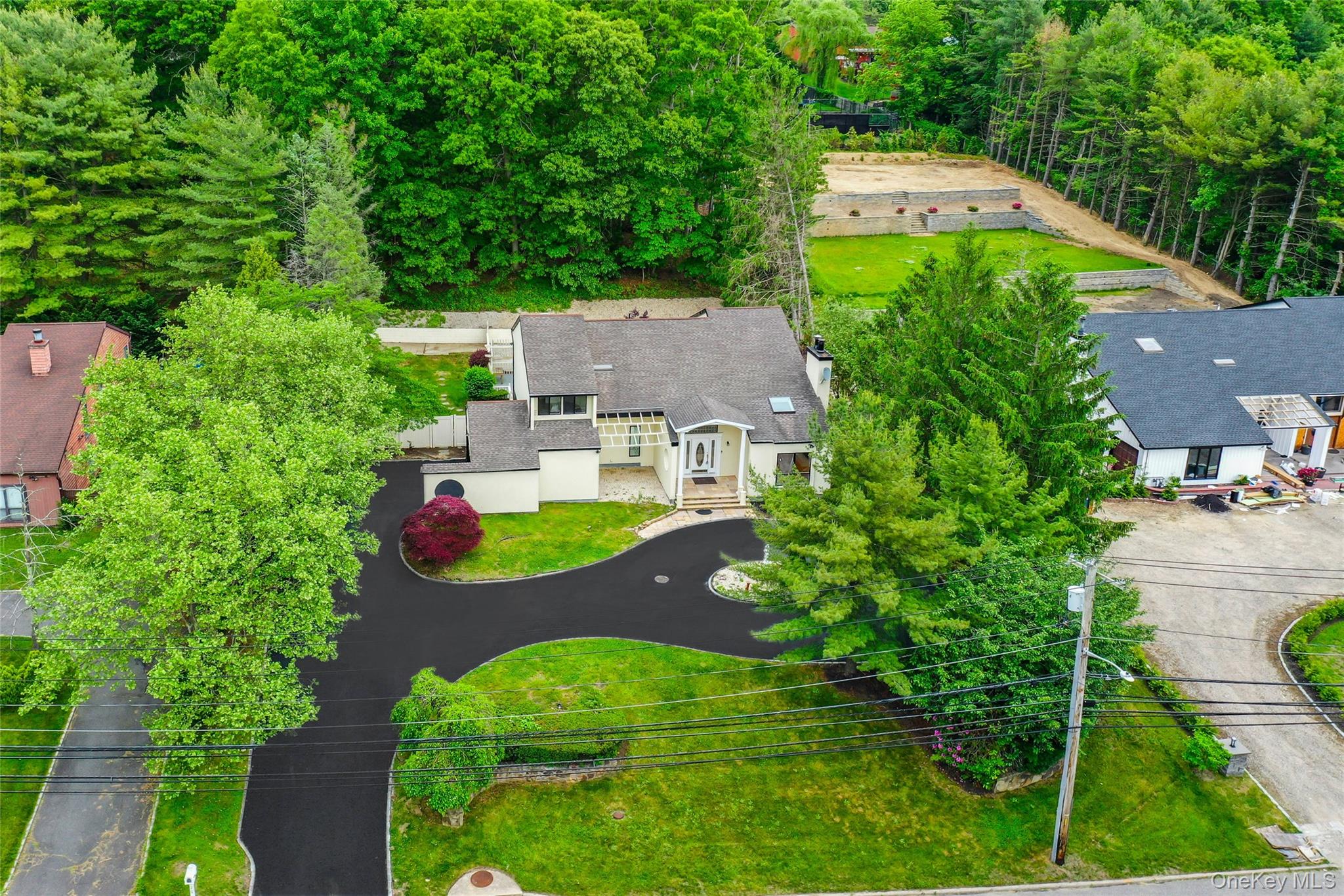 126 Bagatelle Road Melville, NY 11747 - Photo 3 of 50 an aerial view of a house