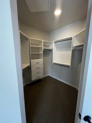 a view of an empty walk in closet