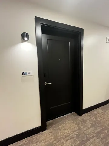 a view of a patio with couches table and chairs and potted plants
