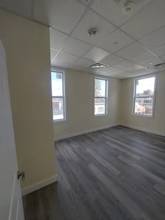 an empty room with windows