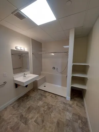 a bathroom with a bath tub