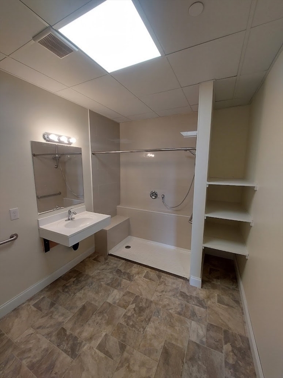 491 Main Street, Unit 11 Athol, MA 01331 - Photo 8 of 10 a bathroom with a tub and shower