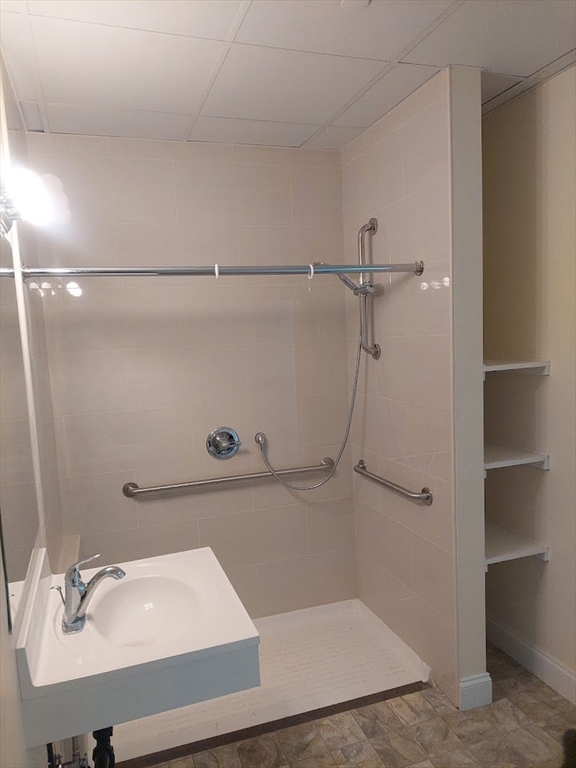 491 Main Street, Unit 11 Athol, MA 01331 - Photo 10 of 10 a bathroom with a sink and shower