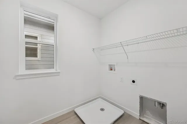 a view of a room that has a window in it