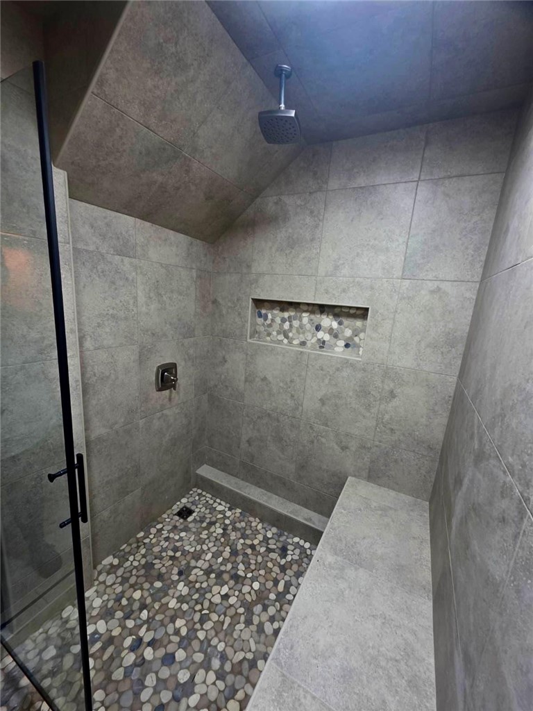 4304 Old Buncombe Road Greenville, SC 29617 - Photo 33 of 49 Unique steam shower cleverly built beneath the basement stairs, creating a private and relaxing spa-like feature.