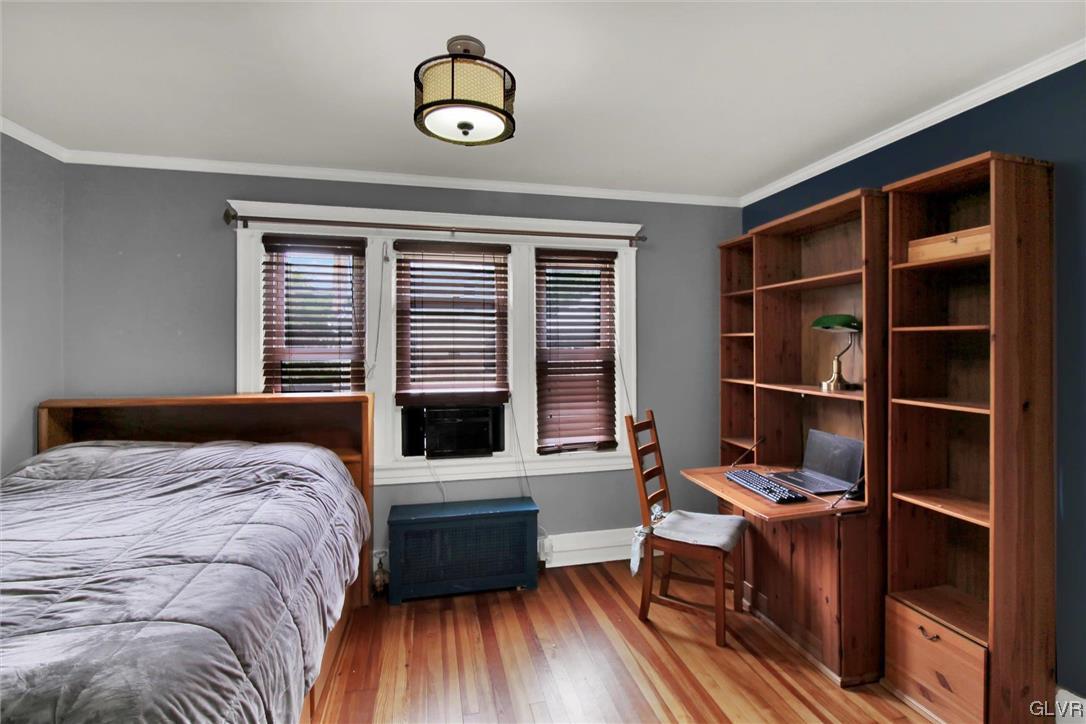 511 Brown Street Stroudsburg, PA 18360 - Photo 14 of 33 a bedroom with a bed and a desk