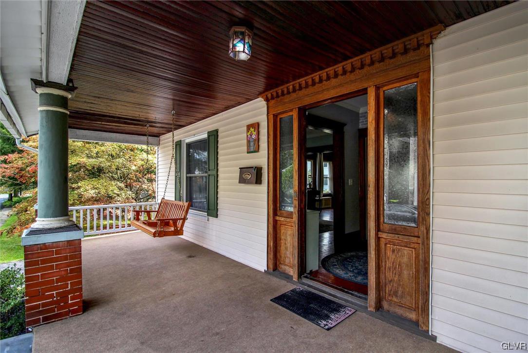 511 Brown Street Stroudsburg, PA 18360 - Photo 3 of 33 a outdoor space with patio couch and a large window
