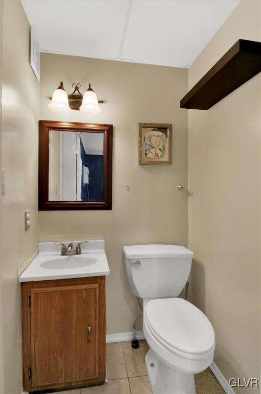 511 Brown Street Stroudsburg, PA 18360 - Photo 10 of 33 a bathroom with a toilet a sink and mirror