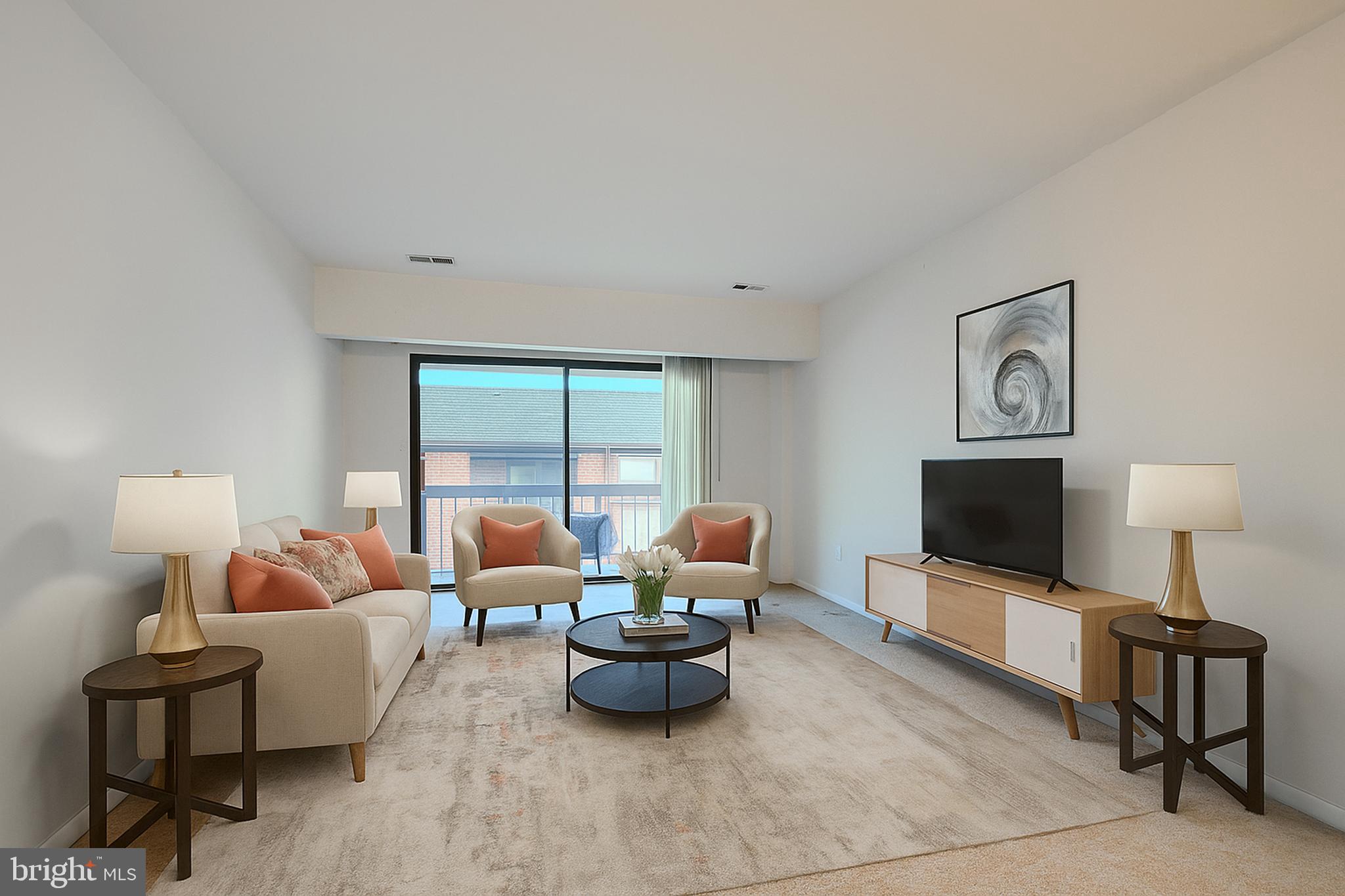 4 Juliet Lane, Unit 301 Baltimore, MD 21236 - Photo 1 of 29 a living room with furniture and a flat screen tv