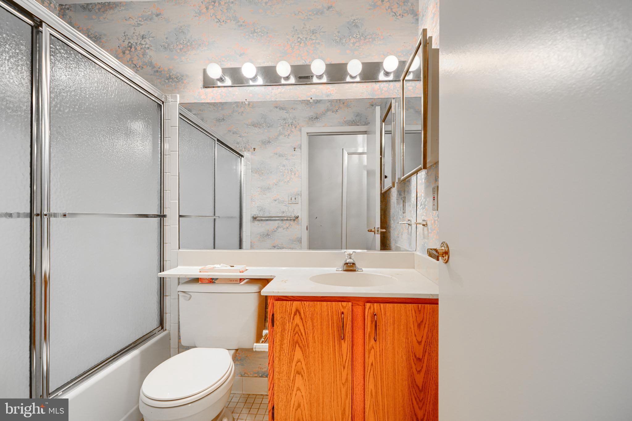 4 Juliet Lane, Unit 301 Baltimore, MD 21236 - Photo 22 of 29 a bathroom with a sink a toilet and shower