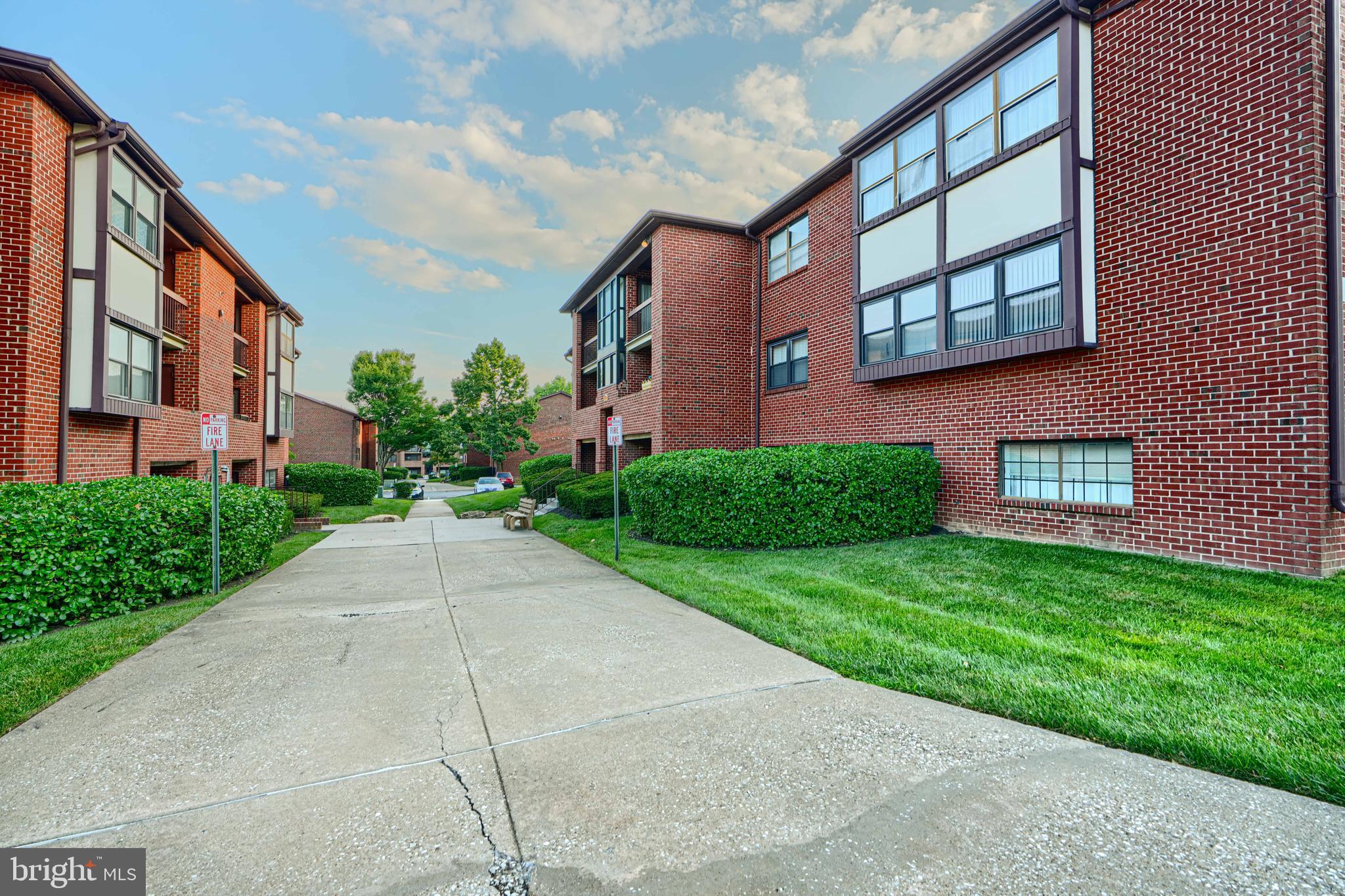 4 Juliet Lane, Unit 301 Baltimore, MD 21236 - Photo 27 of 29 a view of a building with a yard