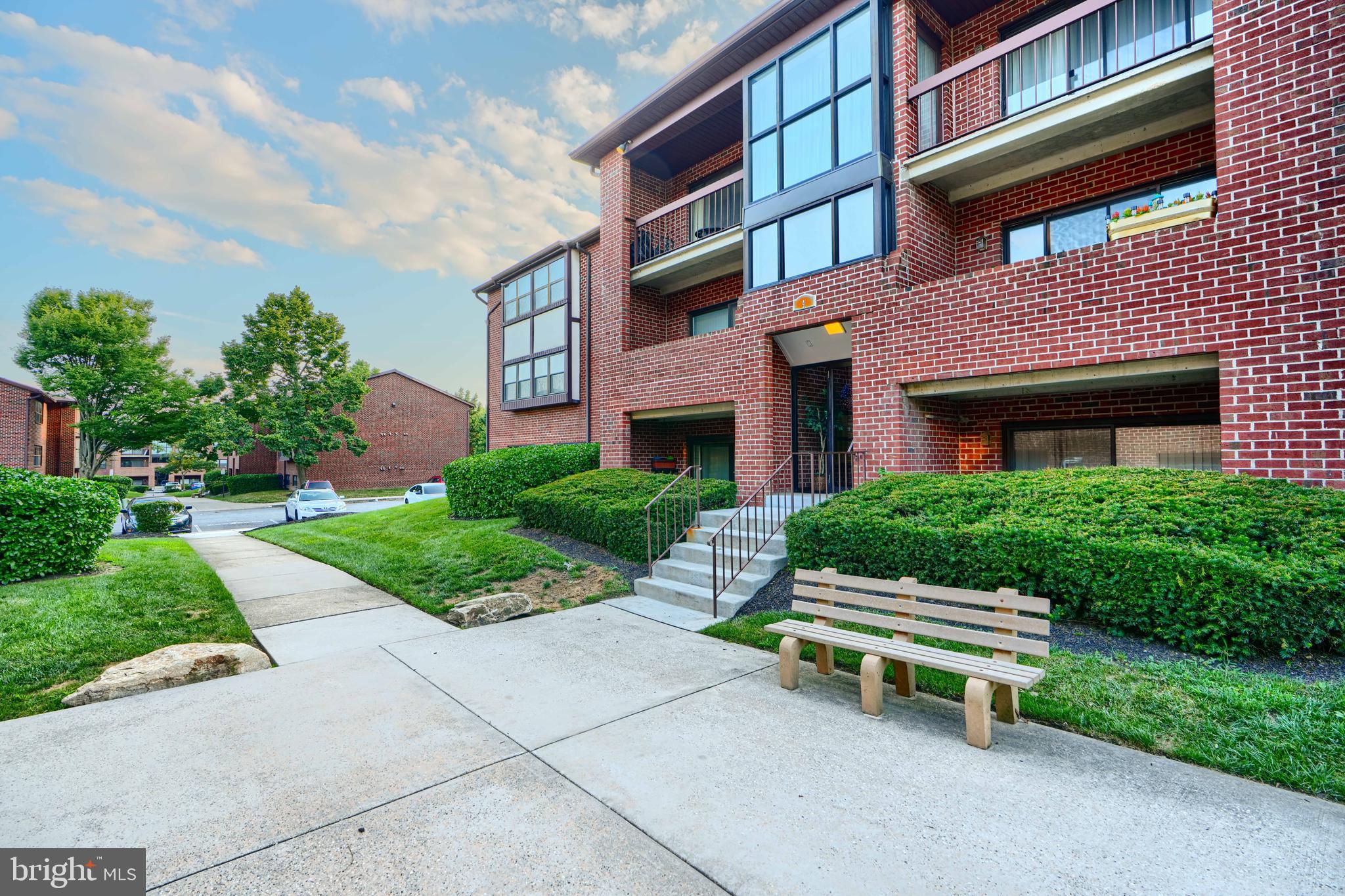 4 Juliet Lane, Unit 301 Baltimore, MD 21236 - Photo 28 of 29 a view of a brick building next to a yard