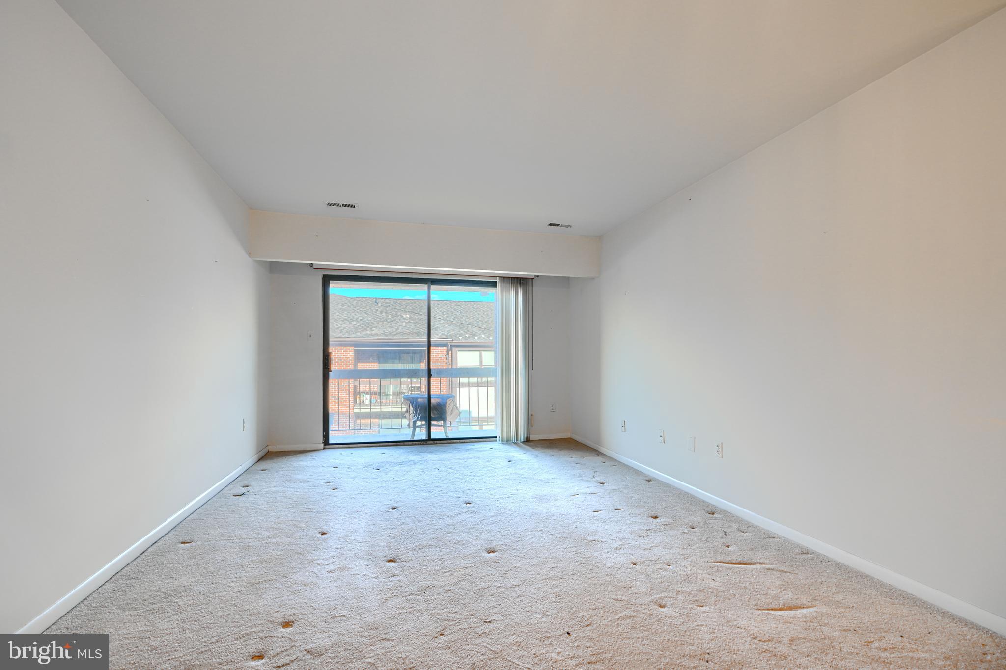 4 Juliet Lane, Unit 301 Baltimore, MD 21236 - Photo 5 of 29 a view of an empty room with a window