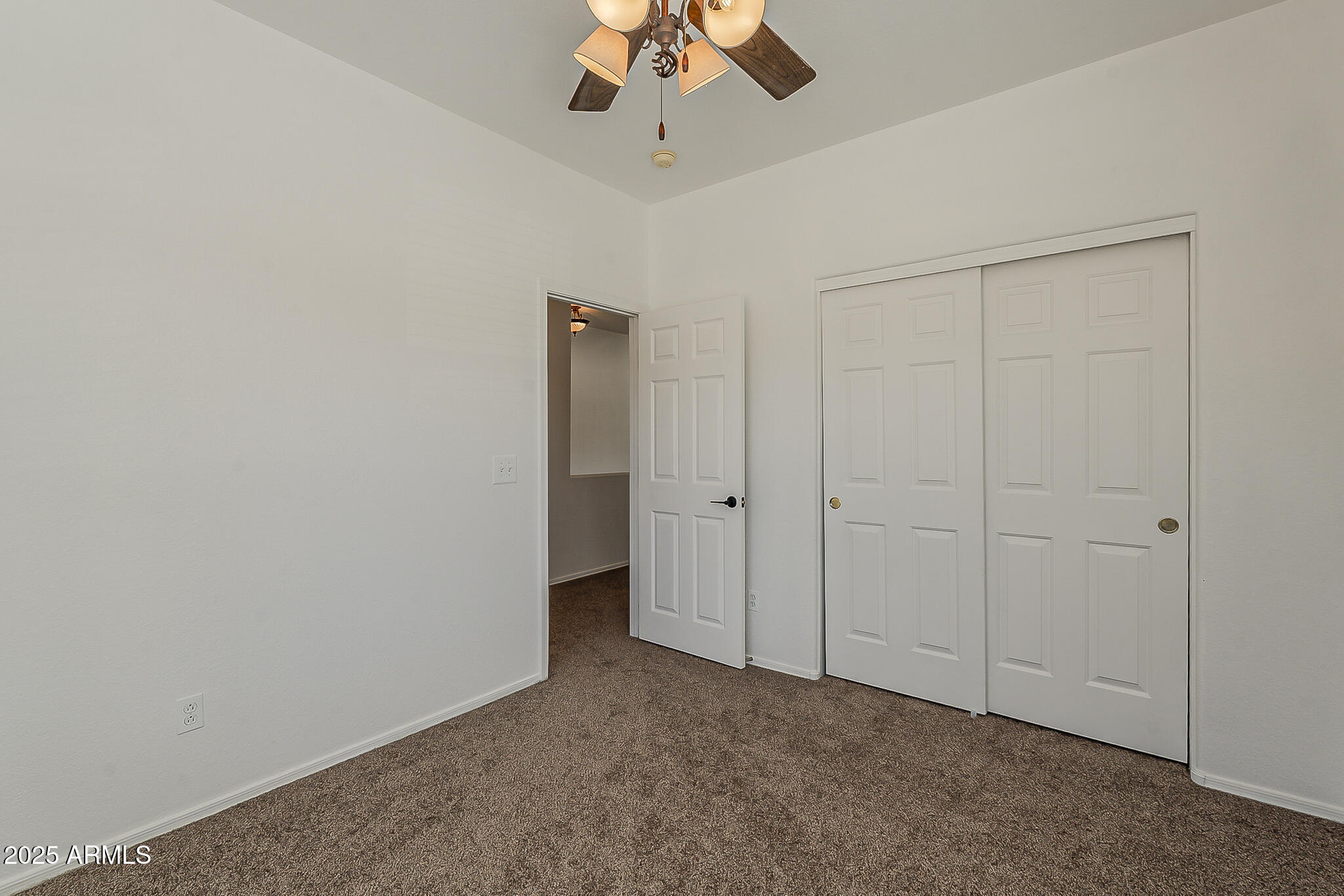 2286 East Peach Tree Drive Chandler, AZ 85249 - Photo 17 of 33 a view of an empty room and chandelier fan