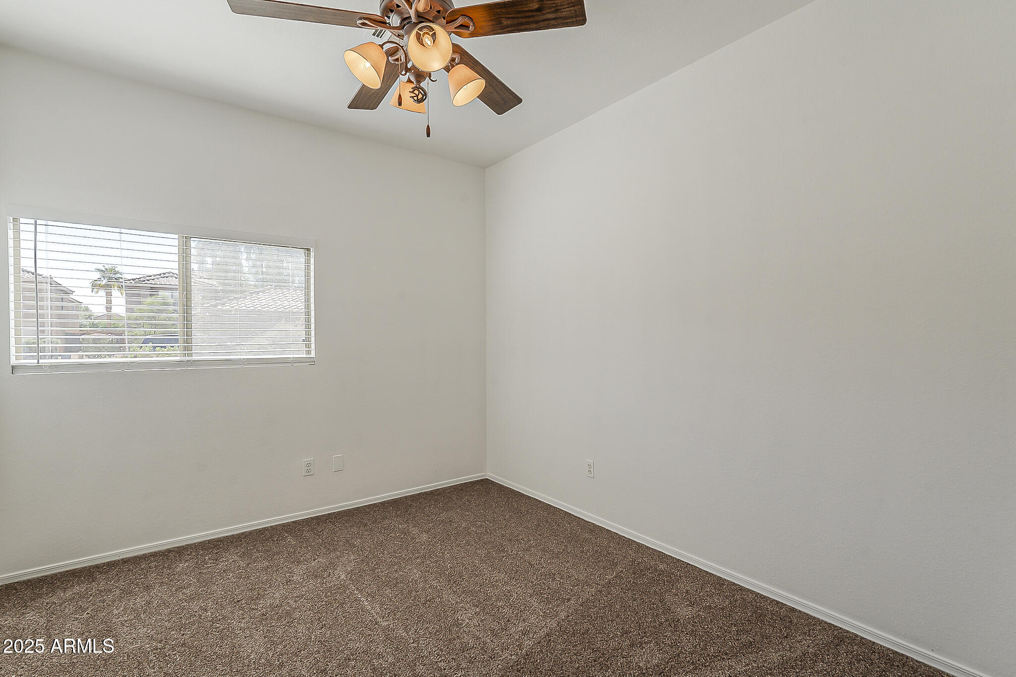 2286 East Peach Tree Drive Chandler, AZ 85249 - Photo 18 of 33 an empty room with a window