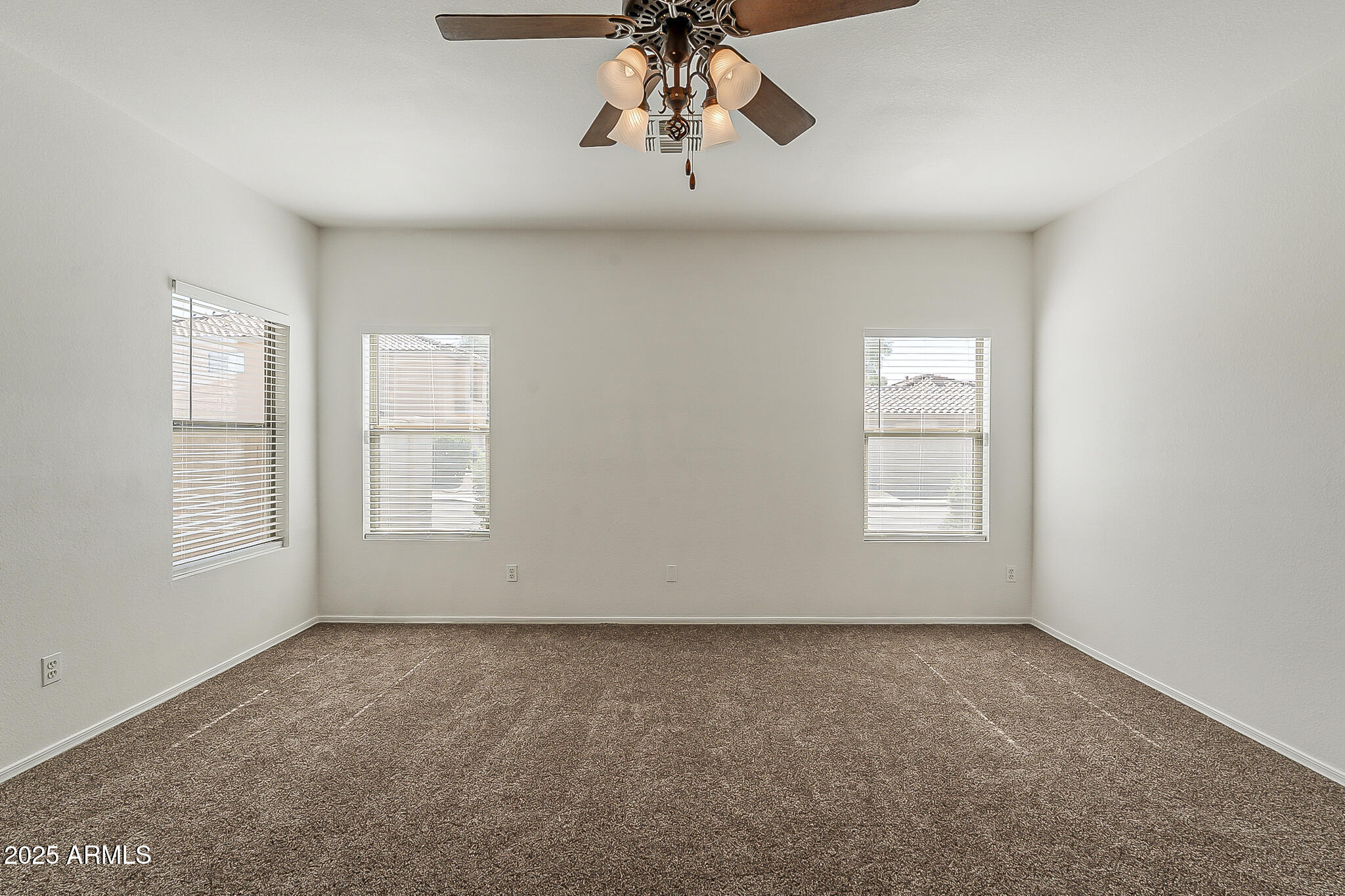 2286 East Peach Tree Drive Chandler, AZ 85249 - Photo 21 of 33 an empty room with windows