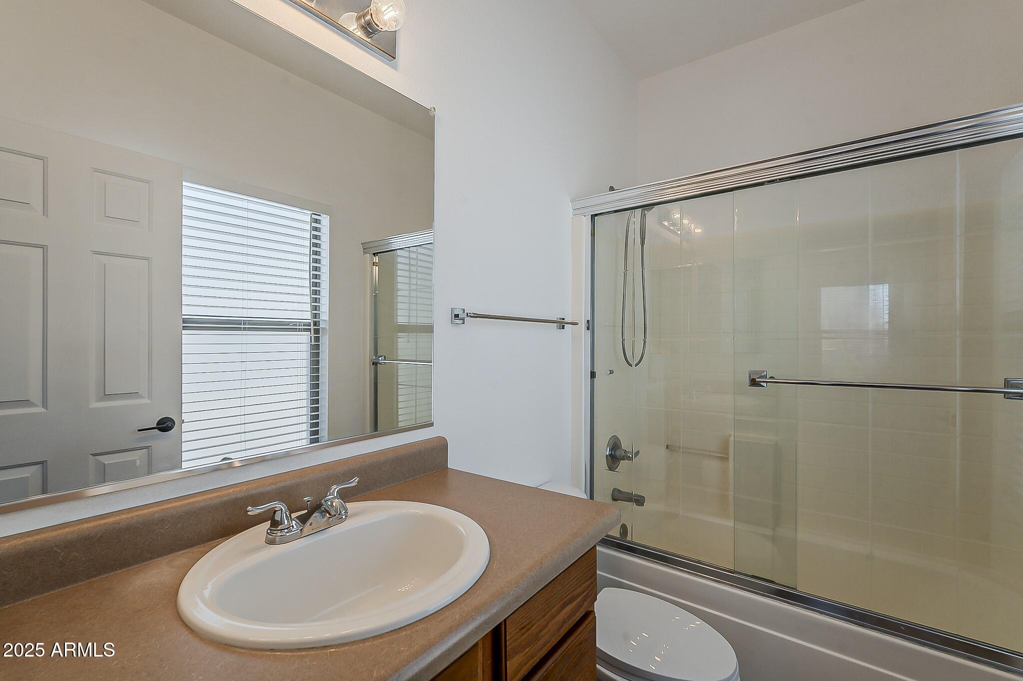 2286 East Peach Tree Drive Chandler, AZ 85249 - Photo 26 of 33 a bathroom with a sink toilet and shower