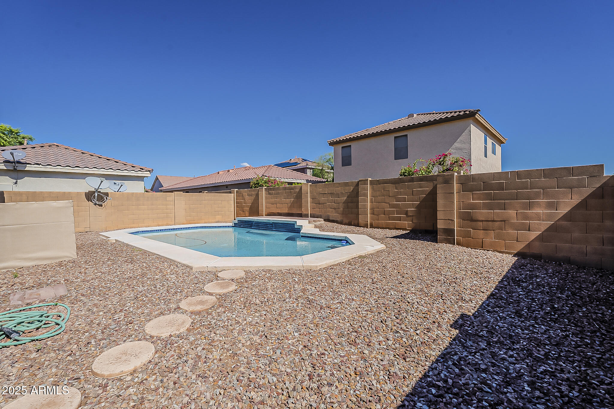2286 East Peach Tree Drive Chandler, AZ 85249 - Photo 30 of 33 a front view of a house with a yard