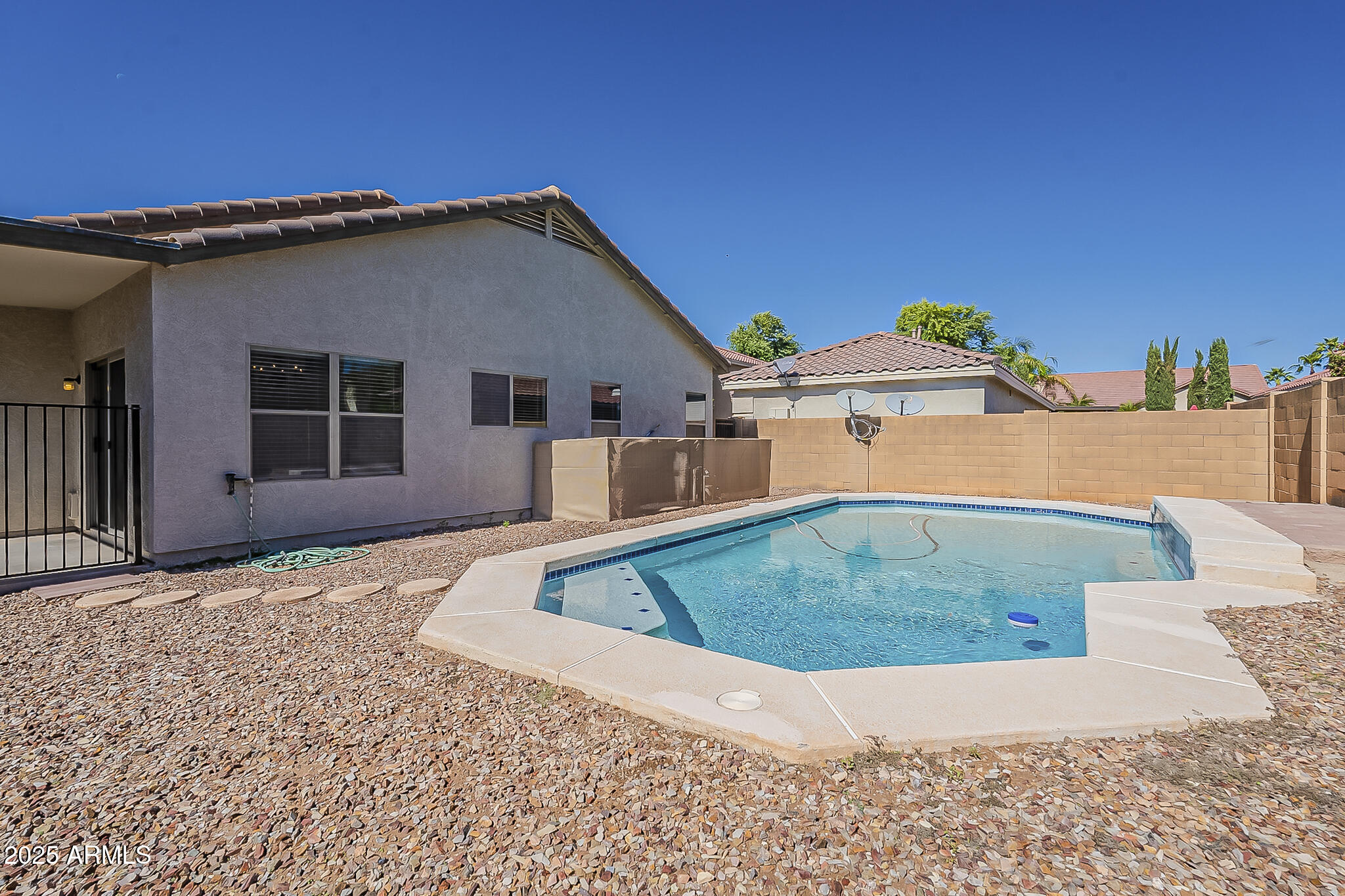 2286 East Peach Tree Drive Chandler, AZ 85249 - Photo 31 of 33 a view of a house with a backyard space
