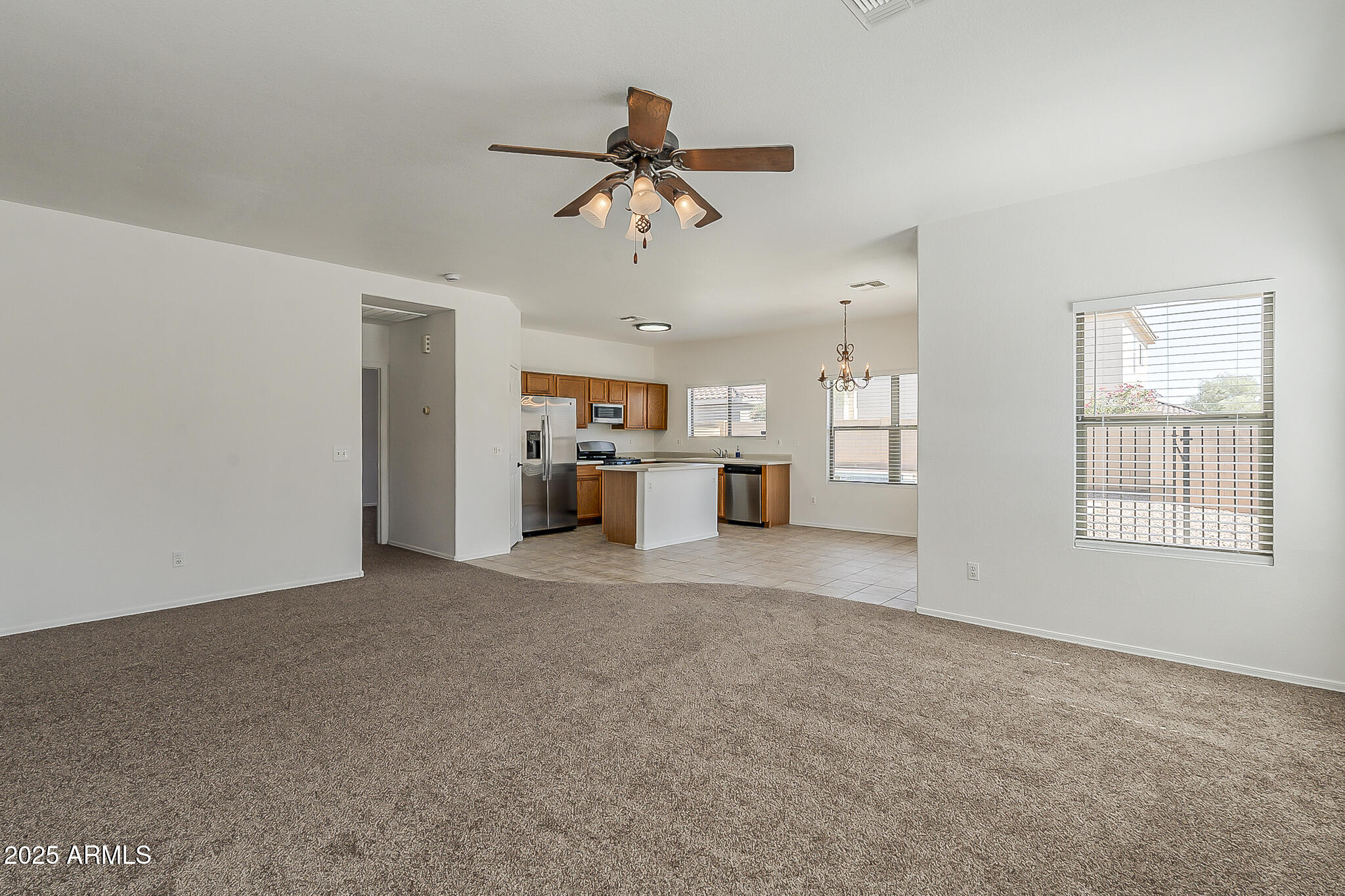 2286 East Peach Tree Drive Chandler, AZ 85249 - Photo 4 of 33 a view of a kitchen with a sink and a window