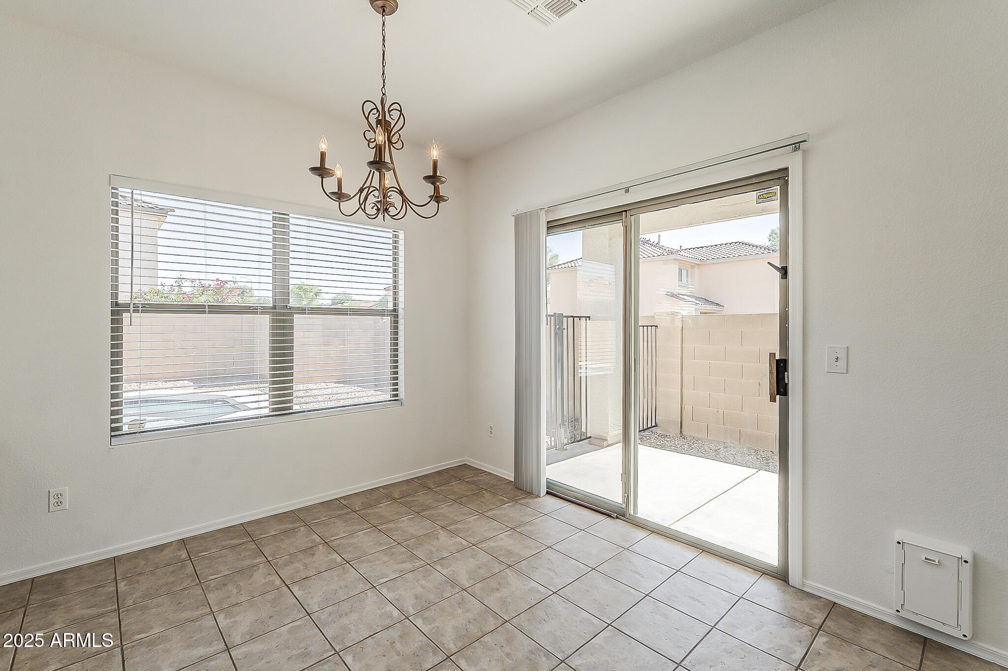 2286 East Peach Tree Drive Chandler, AZ 85249 - Photo 7 of 33 a view of an empty room and window