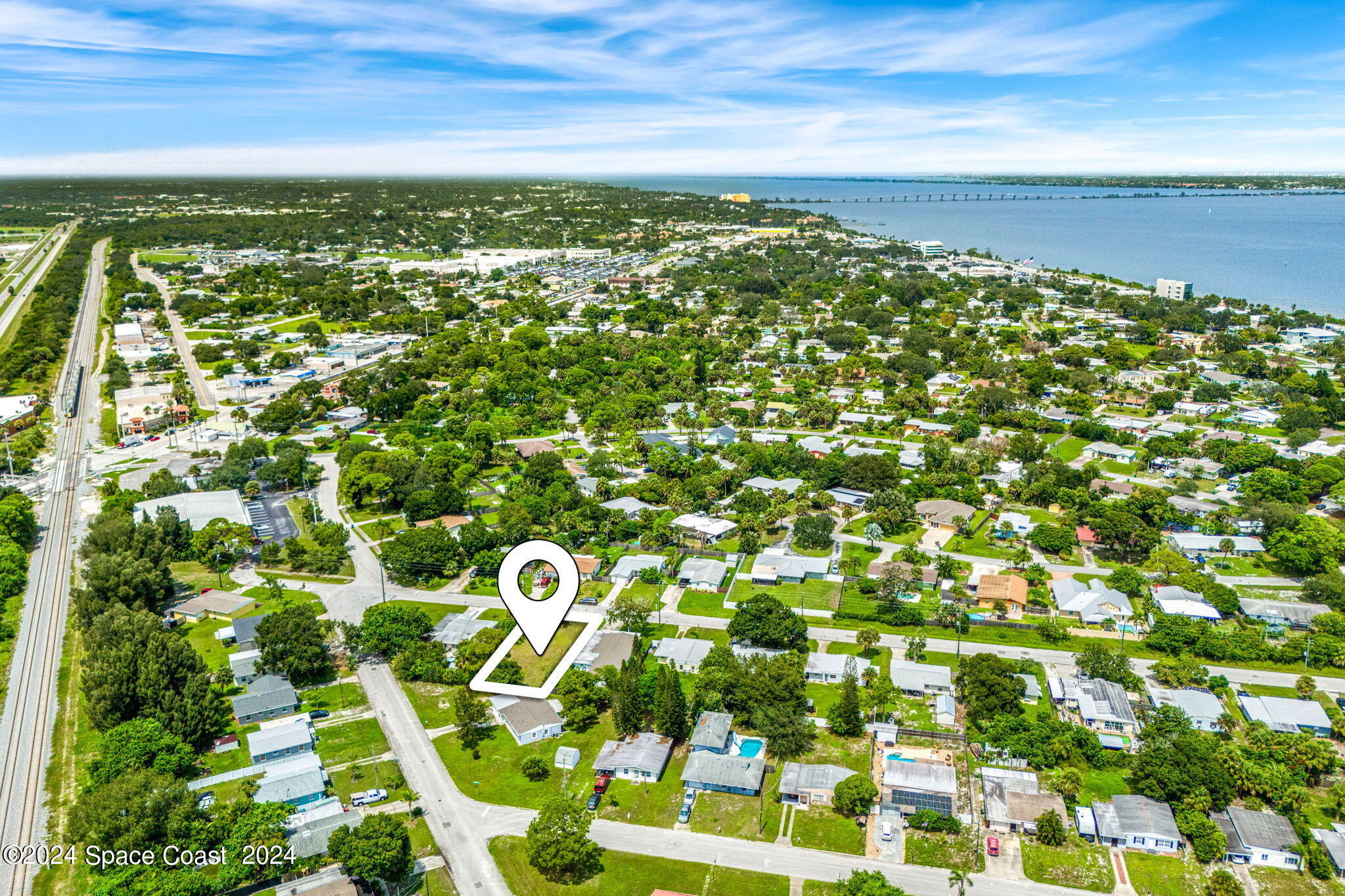 105 Cherry Street Melbourne, FL 32901 - Photo 11 of 14 12-web-or-mls-DJI_20240905133302_0003_D