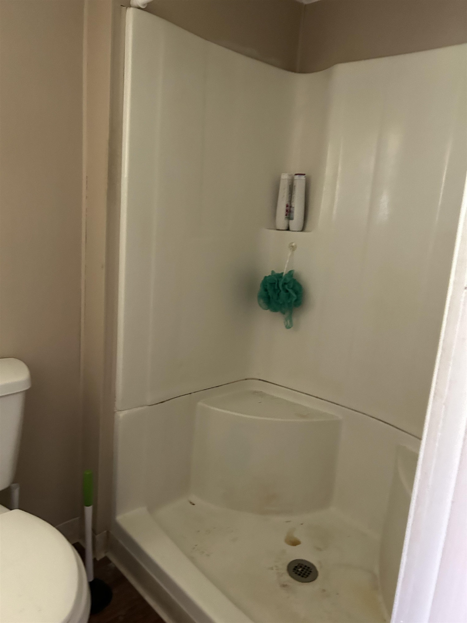 1414 Mason Road Durham, NC 27712 - Photo 15 of 16 a bathroom with a shower and toilet