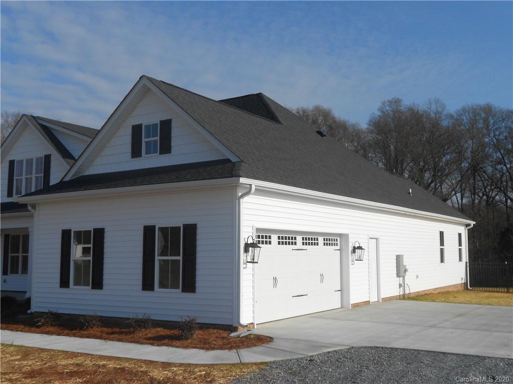5606 Unionville-Brief Road Monroe, NC 28110 - Photo 2 of 21 a front view of a house with a yard
