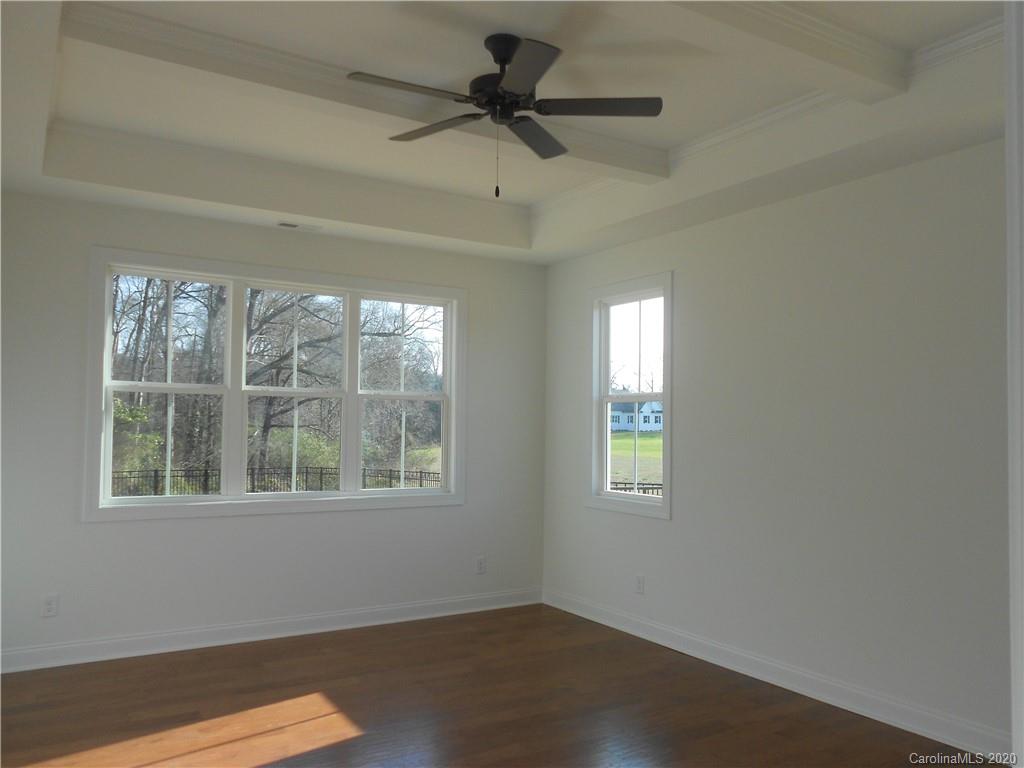 5606 Unionville-Brief Road Monroe, NC 28110 - Photo 13 of 21 a view of an empty room with a window