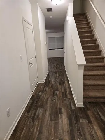 wooden floor with entryway
