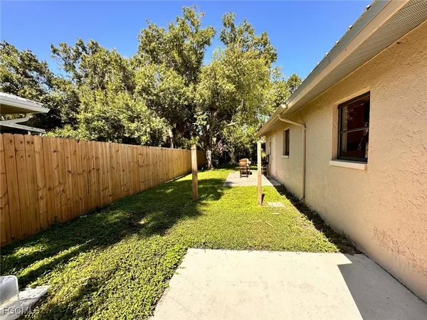 a view of backyard with green space