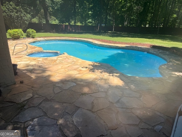 558 Kenwood Road Fayetteville, GA 30214 - Photo 30 of 33 a view of a swimming pool and outdoor space