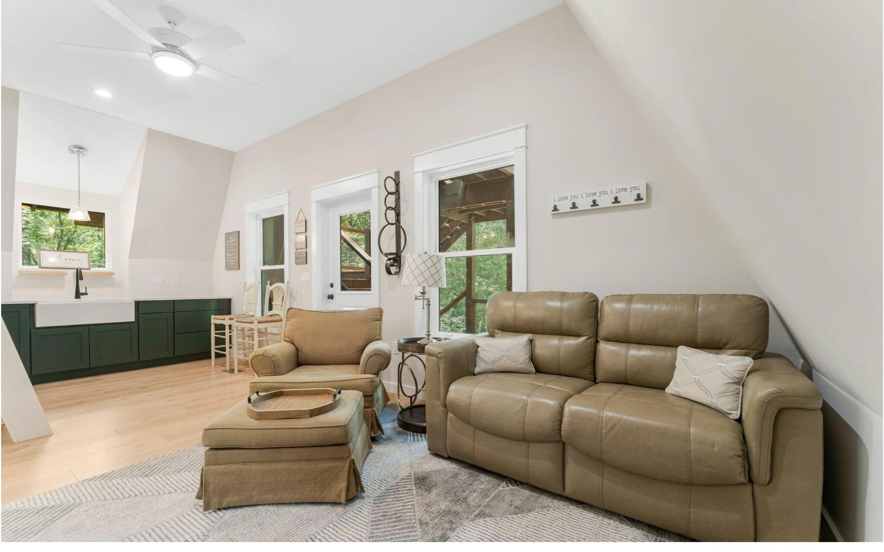 493 Choctawhatchee River Road Ponce de Leon, FL 32455 - Photo 14 of 35 a living room with furniture and a large window