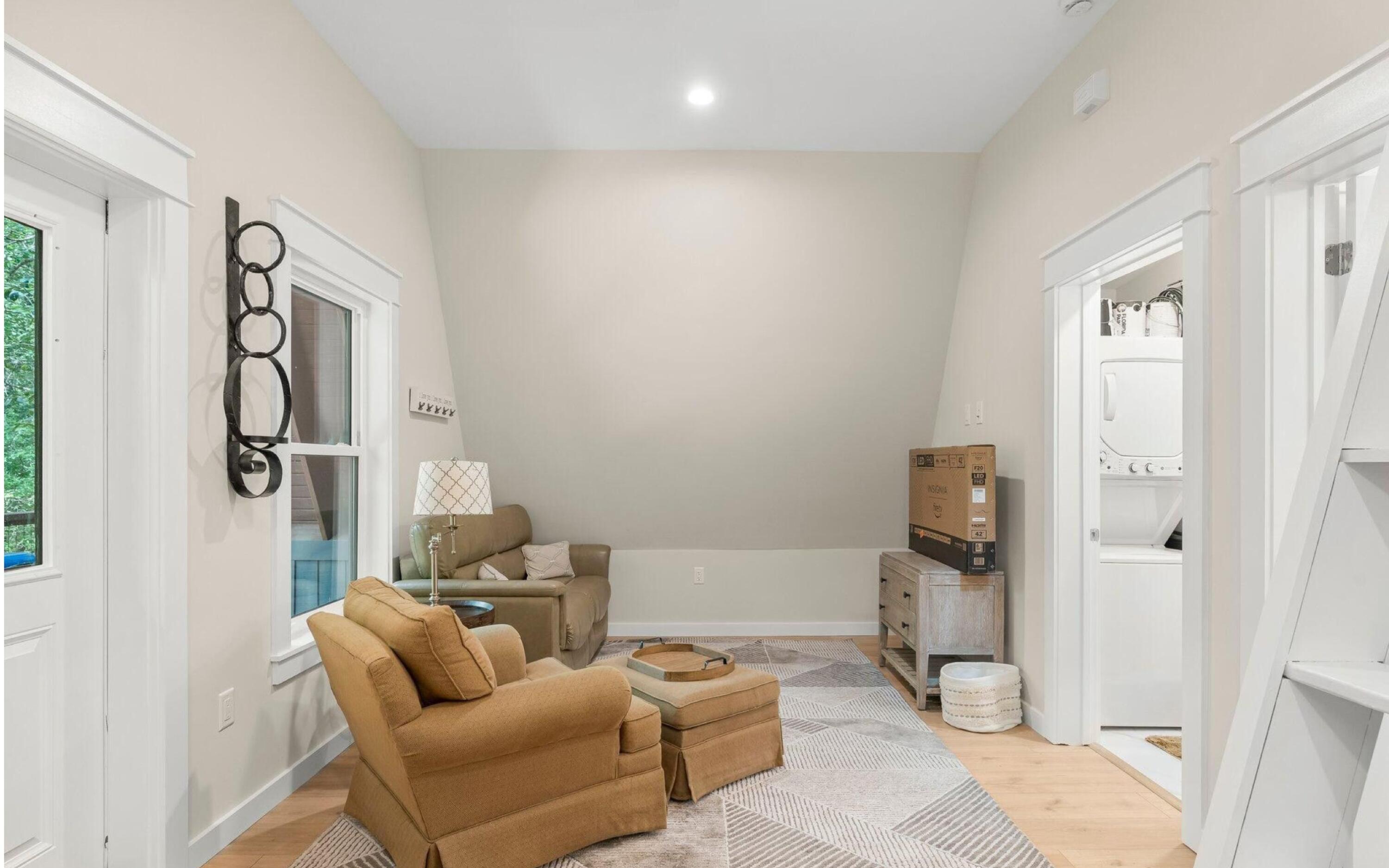 493 Choctawhatchee River Road Ponce de Leon, FL 32455 - Photo 16 of 35 a living room with furniture and a walk in closet