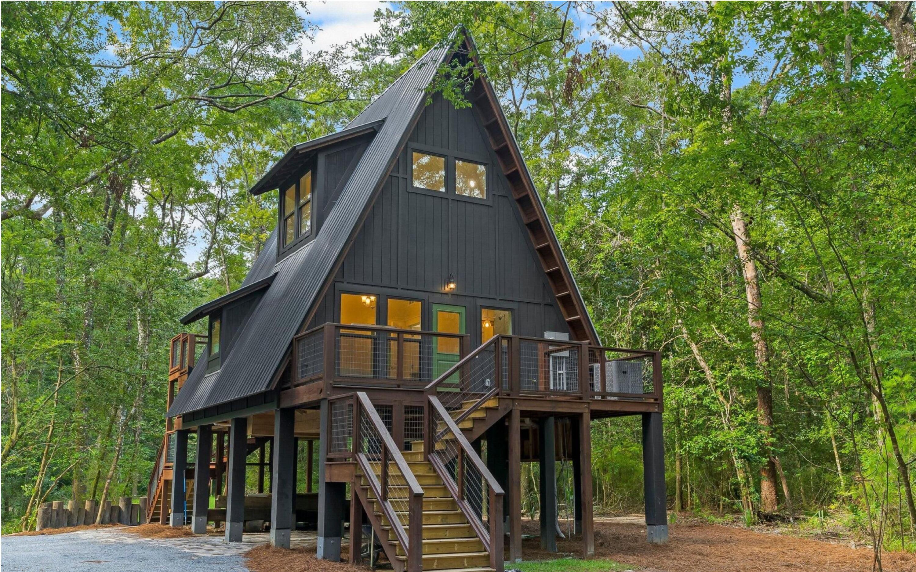 493 Choctawhatchee River Road Ponce de Leon, FL 32455 - Photo 35 of 35 a view of a house with a small yard