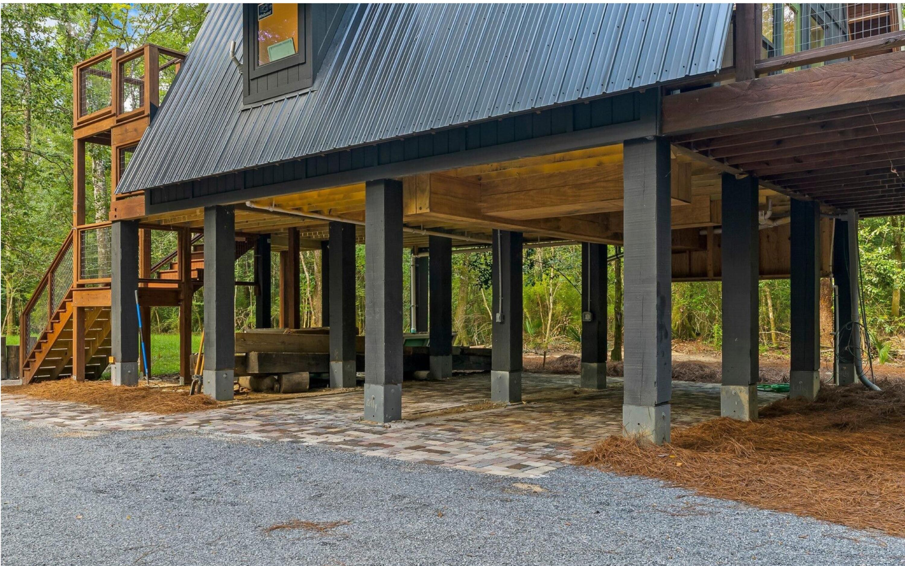 493 Choctawhatchee River Road Ponce de Leon, FL 32455 - Photo 7 of 35 a view of a house with a large windows